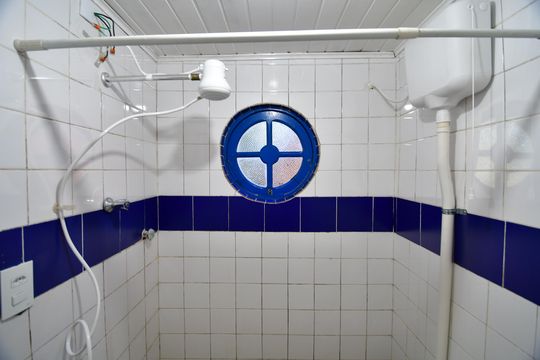Banheiro social de kitnet/studio para alugar com 1 quarto, 30m² em Chácara Santa Margarida, Campinas