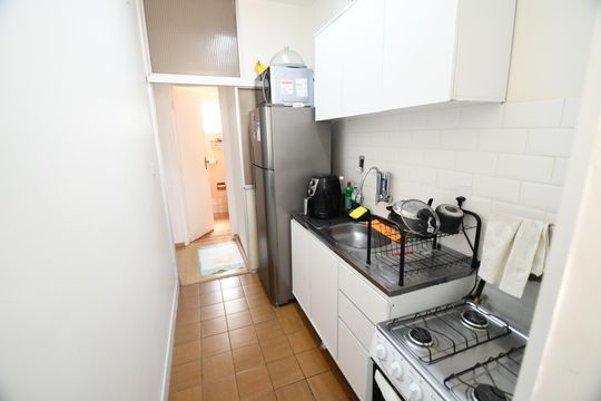 Cozinha de apartamento à venda com 1 quarto, 32m² em Centro, Campinas
