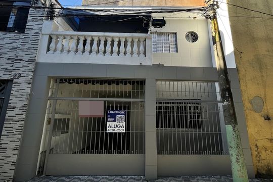 Fachada+Placa  de casa para alugar com 2 quartos, 130m² em Vila Ré, São Paulo