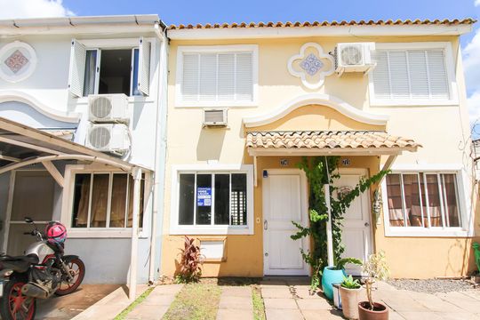 Fachada de casa de condomínio à venda com 2 quartos, 88m² em Rio Branco, Canoas