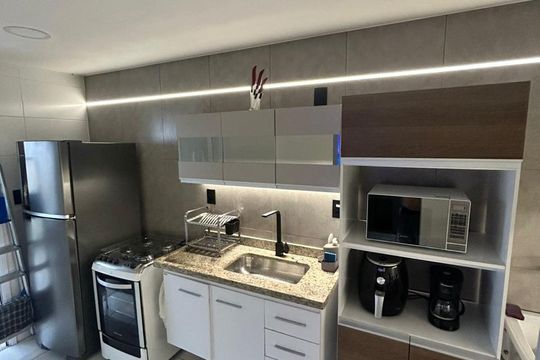 Cozinha de apartamento para alugar com 2 quartos, 74m² em Loteamento Joao Batista Juliao, Guarujá