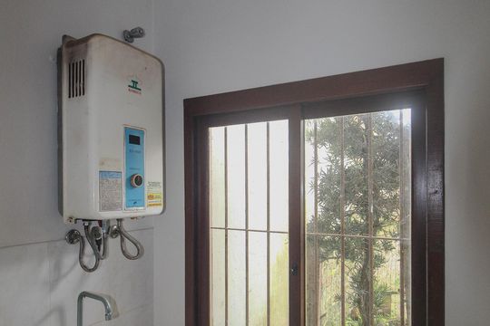 Área de Serviço de casa de condomínio para alugar com 3 quartos, 100m² em Vila Nova, Porto Alegre