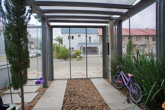 Garagem de casa de condomínio à venda com 3 quartos, 129m² em Hípica, Porto Alegre