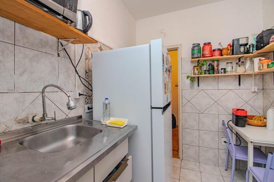 Cozinha e Área de Serviço de apartamento à venda com 2 quartos, 82m² em Centro Histórico, Porto Alegre