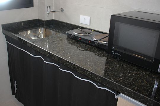 Cozinha de apartamento para alugar com 1 quarto, 31m² em Bela Vista, São Paulo