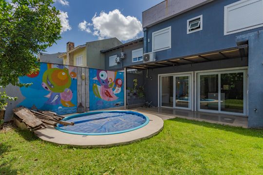 Quintal de casa de condomínio à venda com 3 quartos, 138m² em Passo das Pedras, Porto Alegre