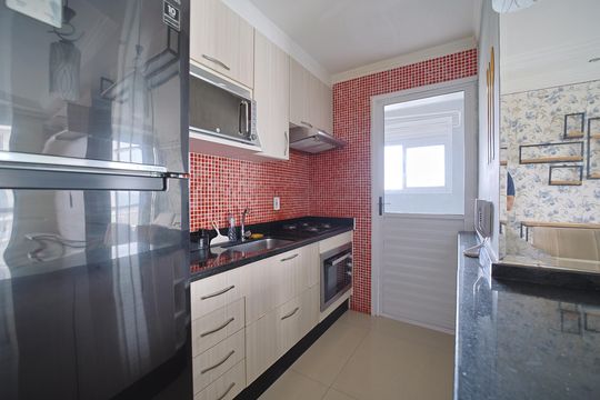 Cozinha de apartamento para alugar com 2 quartos, 47m² em Parque Paineiras, São Paulo