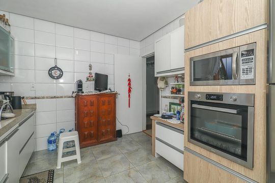 Cozinha de casa à venda com 4 quartos, 400m² em Bom Jesus, Porto Alegre
