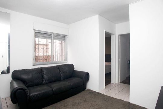 Sala de apartamento à venda com 2 quartos, 55m² em Petrópolis, Porto Alegre