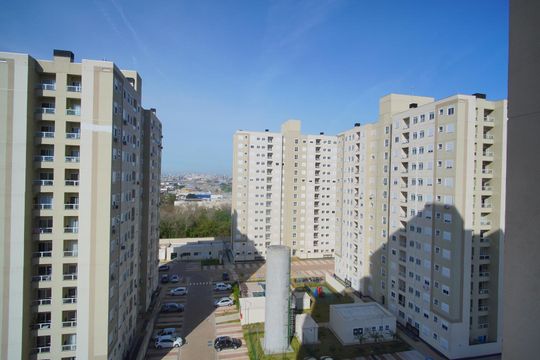 Sala - Vista de apartamento para alugar com 3 quartos, 65m² em Humaitá, Porto Alegre