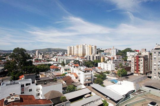Cozinha + Área de Serviço Vista de apartamento à venda com 2 quartos, 52m² em Rio Branco, Porto Alegre
