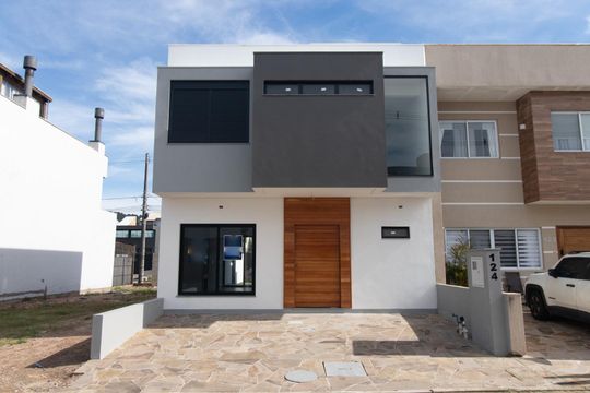 Fachada de casa de condomínio à venda com 3 quartos, 158m² em Aberta dos Morros, Porto Alegre