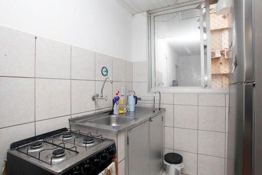 Cozinha de apartamento à venda com 2 quartos, 60m² em Centro Histórico, Porto Alegre