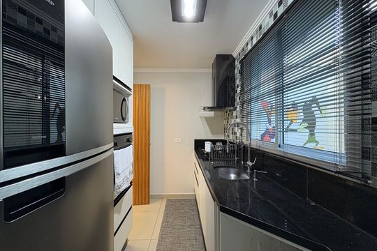 Cozinha de apartamento à venda com 2 quartos, 63m² em Vila Santo Alberto, Santo André