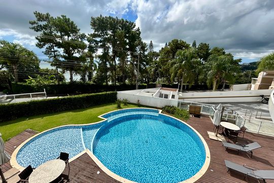 Área comum - Piscina de casa de condomínio para alugar com 4 quartos, 180m² em Cacupé, Florianópolis