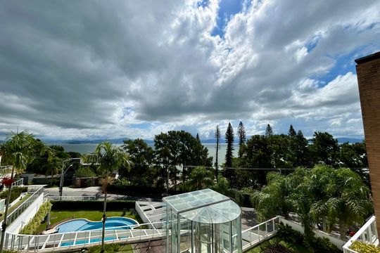 Vista de casa de condomínio para alugar com 4 quartos, 180m² em Cacupé, Florianópolis