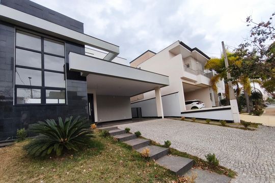 Fachada de casa de condomínio à venda com 3 quartos, 260m² em Swiss Park, Campinas