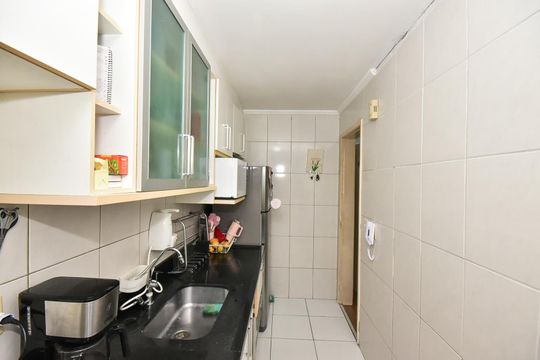Cozinha de apartamento à venda com 2 quartos, 58m² em Paraisópolis, São Paulo