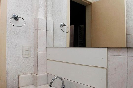 Banheiro da Suíte de apartamento à venda com 1 quarto, 39m² em Higienópolis, Porto Alegre