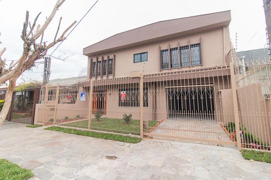 Fachada de casa à venda com 3 quartos, 300m² em Jardim Botânico, Porto Alegre