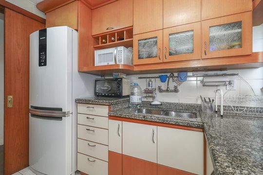 Cozinha de apartamento à venda com 2 quartos, 120m² em Auxiliadora, Porto Alegre