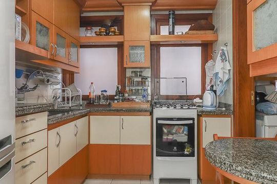 Cozinha de apartamento à venda com 2 quartos, 120m² em Auxiliadora, Porto Alegre