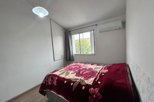 Quarto 1 de casa de condomínio à venda com 2 quartos, 97m² em Humaitá, Porto Alegre