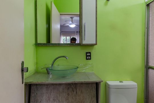 Banheiro da Suíte de casa de condomínio à venda com 4 quartos, 131m² em Cavalhada, Porto Alegre