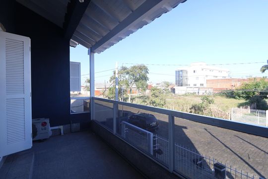 Sacada de casa à venda com 3 quartos, 270m² em Rio Branco, Canoas