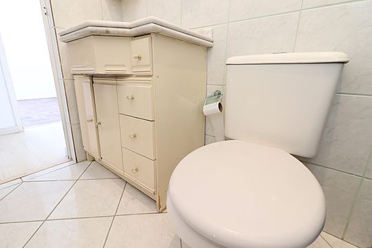 Banheiro de apartamento à venda com 2 quartos, 54m² em Sarandi, Porto Alegre