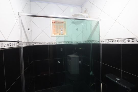 Banheiro da Suíte de casa à venda com 4 quartos, 195m² em Niterói, Canoas