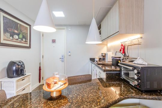 Cozinha de apartamento à venda com 1 quarto, 33m² em Jardim Paulista, São Paulo