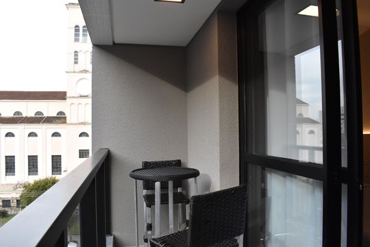 Sacada  de kitnet/studio para alugar com 1 quarto, 25m² em Batel, Curitiba