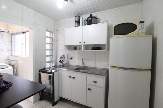 Cozinha de apartamento à venda com 2 quartos, 59m² em Agronomia, Porto Alegre