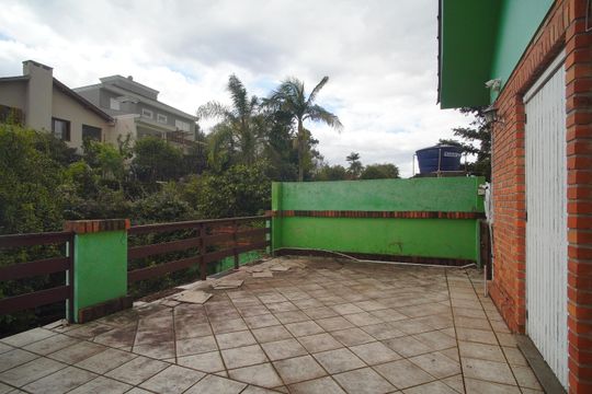 Varanda  do Quarto 2 de casa para alugar com 3 quartos, 490m² em Vila Nova, Novo Hamburgo