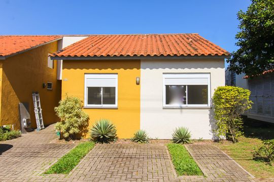 Fachada de casa de condomínio à venda com 3 quartos, 66m² em Olaria, Canoas