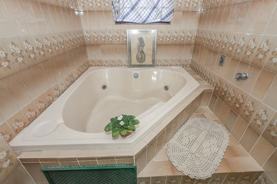 Banheiro da Suíte 3 de casa à venda com 3 quartos, 308m² em Boa Vista, Porto Alegre