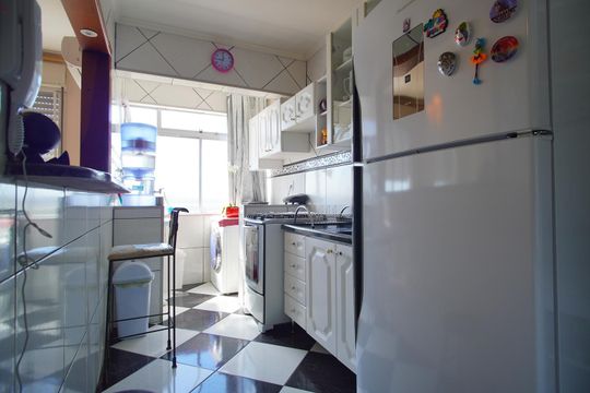 Cozinha e Área de Serviço de apartamento à venda com 3 quartos, 140m² em São Sebastião, Porto Alegre
