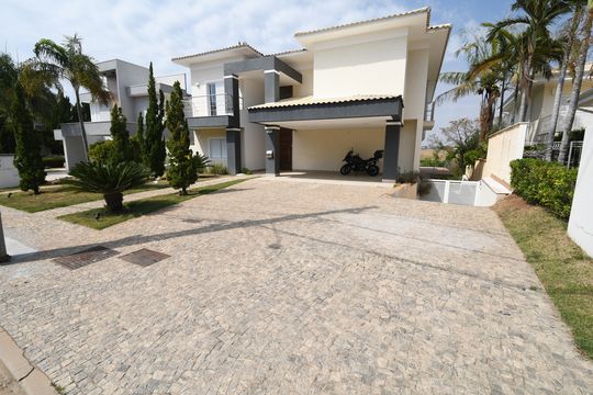 Fachada de casa de condomínio à venda com 5 quartos, 620m² em Loteamento Alphaville Campinas, Campinas