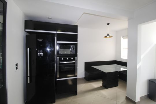 Cozinha de apartamento à venda com 2 quartos, 85m² em Higienópolis, Porto Alegre
