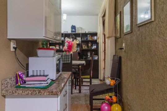 Cozinha e Área de Serviço de casa à venda com 3 quartos, 120m² em Hípica, Porto Alegre