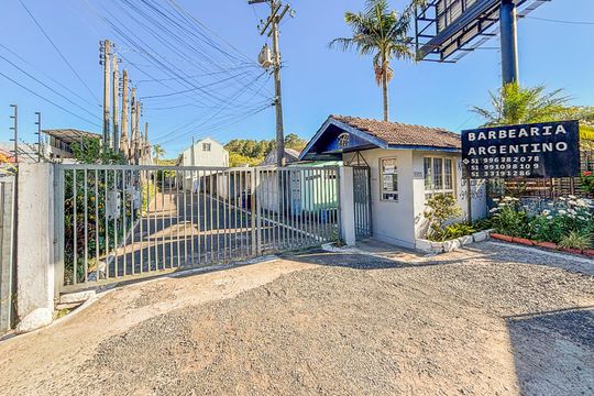 Fachada de casa à venda com 3 quartos, 75m² em Partenon, Porto Alegre