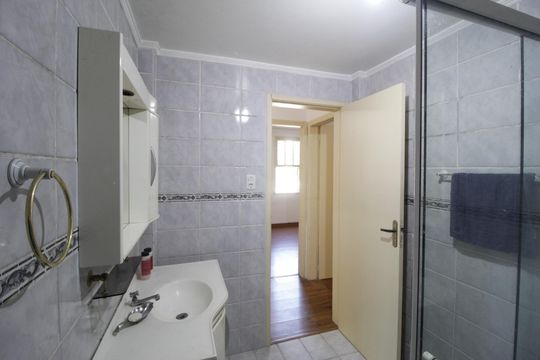 Banheiro Social de apartamento à venda com 2 quartos, 66m² em Petrópolis, Porto Alegre