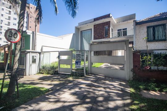 Fachada de casa à venda com 4 quartos, 344m² em Jardim Botânico, Porto Alegre