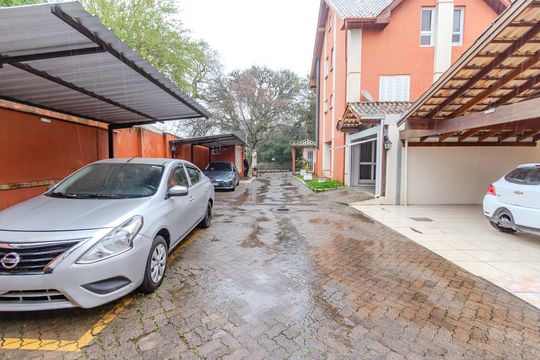 Área comum de casa de condomínio à venda com 3 quartos, 150m² em Teresópolis, Porto Alegre