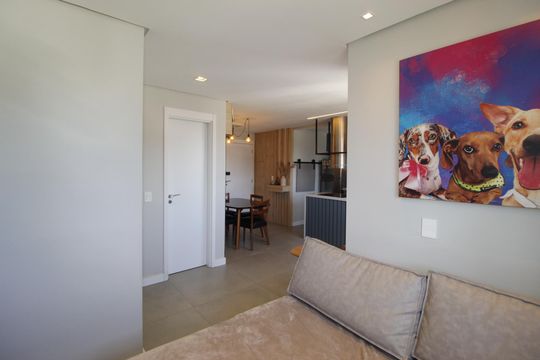 Sala de apartamento à venda com 1 quarto, 57m² em Passo da Areia, Porto Alegre