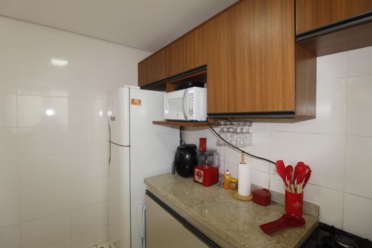 Cozinha e Área de Serviço de apartamento à venda com 2 quartos, 48m² em Morro Santana, Porto Alegre
