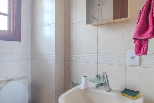 Banheiro 3 de casa à venda com 4 quartos, 238m² em Ipanema, Porto Alegre