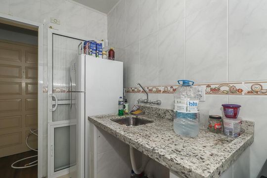 Cozinha de apartamento à venda com 3 quartos, 84m² em São João, Porto Alegre