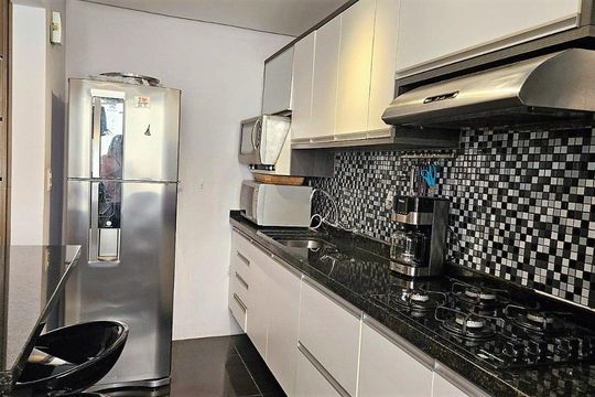Cozinha de apartamento à venda com 2 quartos, 51m² em Petrópolis, Porto Alegre